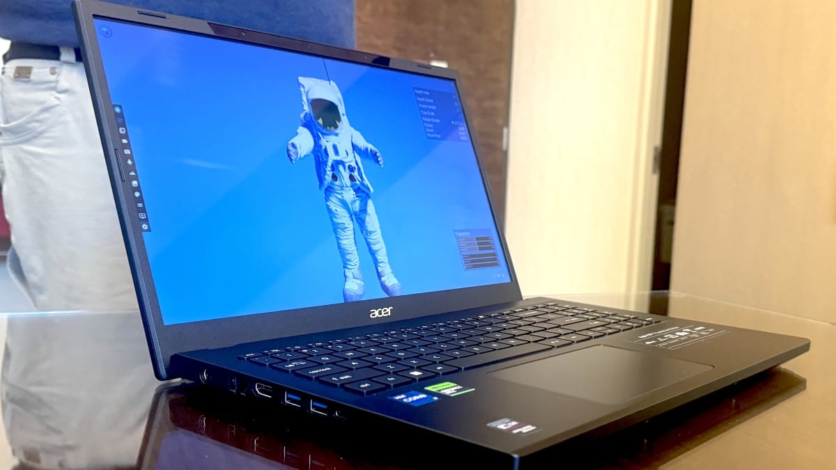 CES 2024: Your eyes aren't deceiving you. Arms are 'sticking out' of this 3D laptop.